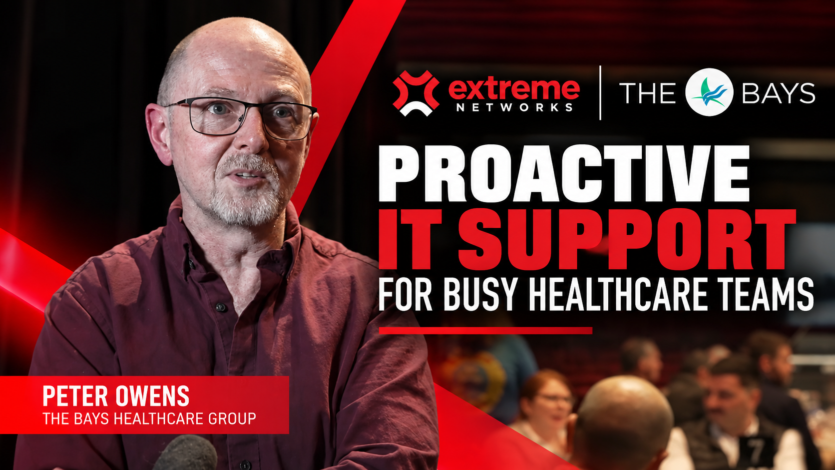 Peter Owens from The Bays Healthcare, a private hospital in Mornington, speaks to camera at an Extreme Networks client event about 20 years of helpdesk, server management and cybersecurity support from Extreme.